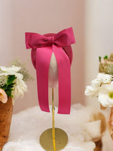 Load image into Gallery viewer, Pink Satin Bow Headband Fascinator, on a Sinamay Halo Base, with tails